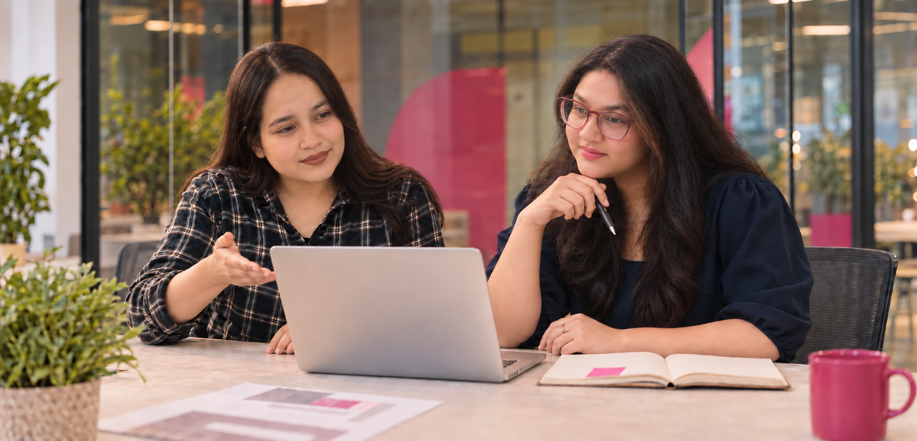Anjali Rathore showing Himanshi Singh work on a laptop